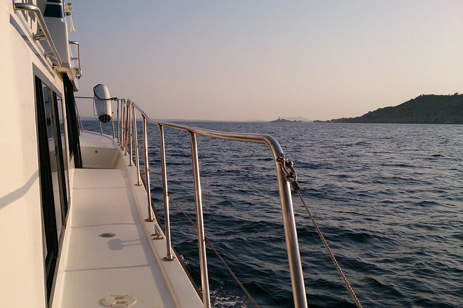 Alcudia 3hr Sunset Trip with Drinks, Tapas, SUP & Snorkel - Stop 2: Alcanada Lighthouse anchor for sunset swim and snorkel