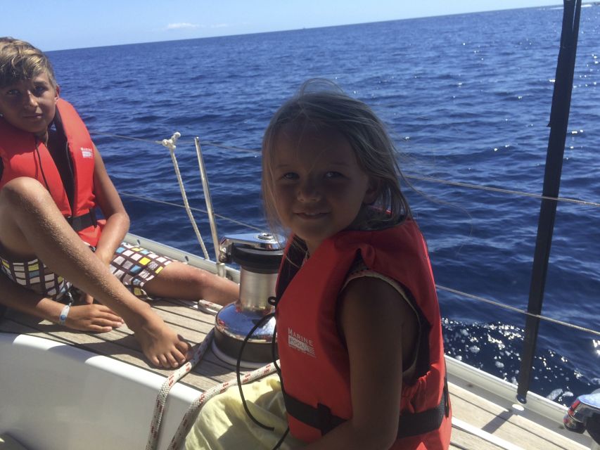Alcudia: Sailing Yacht Excursion with Wine & Tapas - Take the wheel: why steering changes the whole feeling