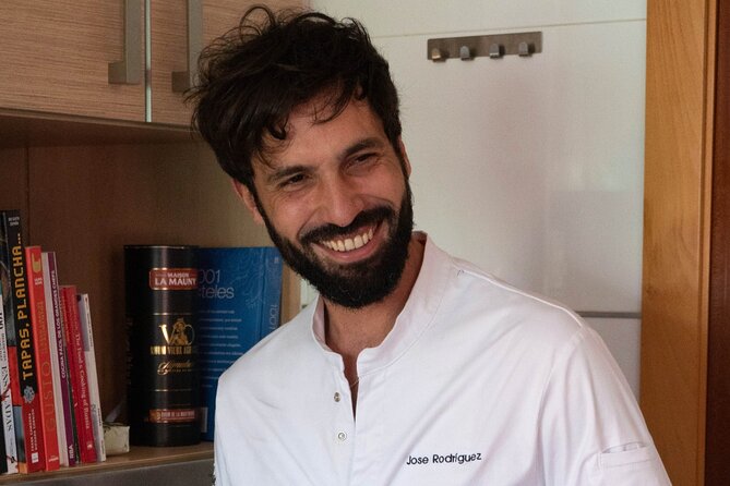 Any Day is Sunday: Paella Cooking Class with Tapas and Sangria - Meet Your Host and Settle Into a Cozy Cooking Table