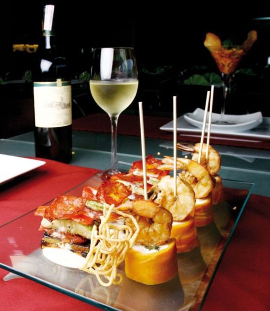 Barcelona: Evening Walking Tour in the Gaudi Area with Tapas - Stop 2: pintxos—small bites with northern Spain attitude