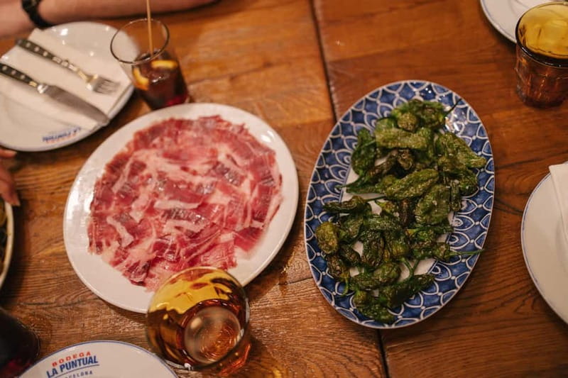 Barcelona: Food Walking Tour with Tapas and Wine - Four pre-booked eateries and how priority service changes your night