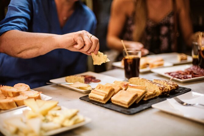 Barcelona Gothic Quarter Tapas & Taverns Food & Wine Tour - Entering Barcelona’s Gothic Quarter with tapas as your compass