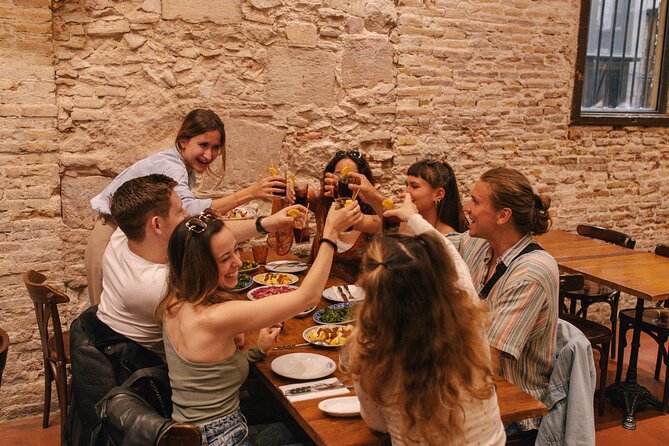 Barcelona: Guided Food Walking Tour with Tapas and Wine - Meeting at Plaça de Correus and Getting Oriented Fast