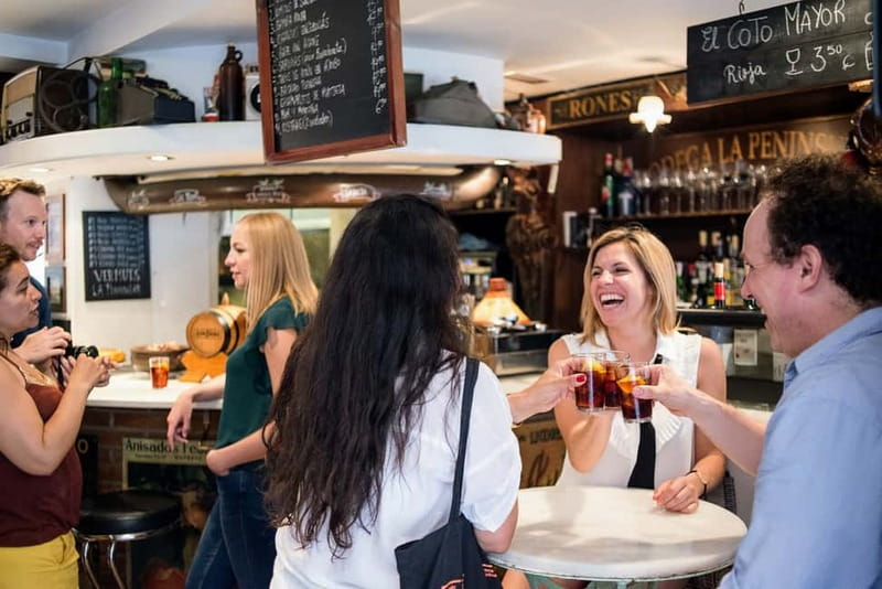 Barcelona: Hidden Markets, Tapas & Paella Food Tour - Bodega La Peninsular and the bomba + vermouth moment