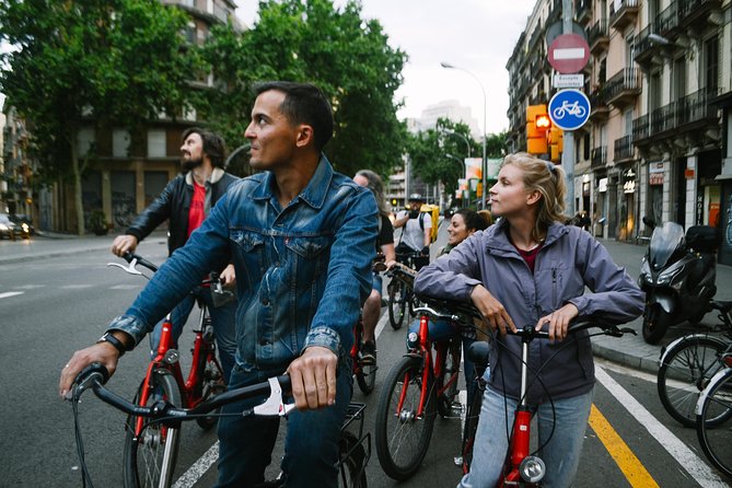 Barcelona Night Bike Tour with Local Tapas and Cava Stop - What the Barcelona night bike tour is like (4 hours, small group, good pacing)