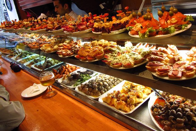 Barcelona Old Town Night Small Group Tour with Tapas & Flamenco - Gothic Quarter Night Walk: Medieval Streets With Less Stress