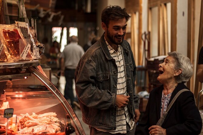 Barcelona Private Food Tour: Tapas, Paella & 8+ Food Tastings - La Barceloneta finish: seafood neighborhood energy by the sea