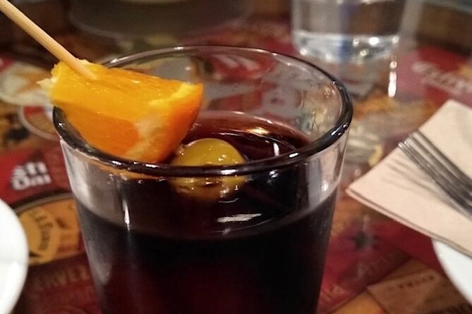 Barcelona´s Lunch or Dinner Tapas Tour: Food, drinks, happiness! - A narrow medieval street stop that slows everything down