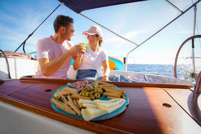 Barcelona Sailing Experience: Spanish Tapas and Premium Open Bar - Before you go: what to pack and how to get there