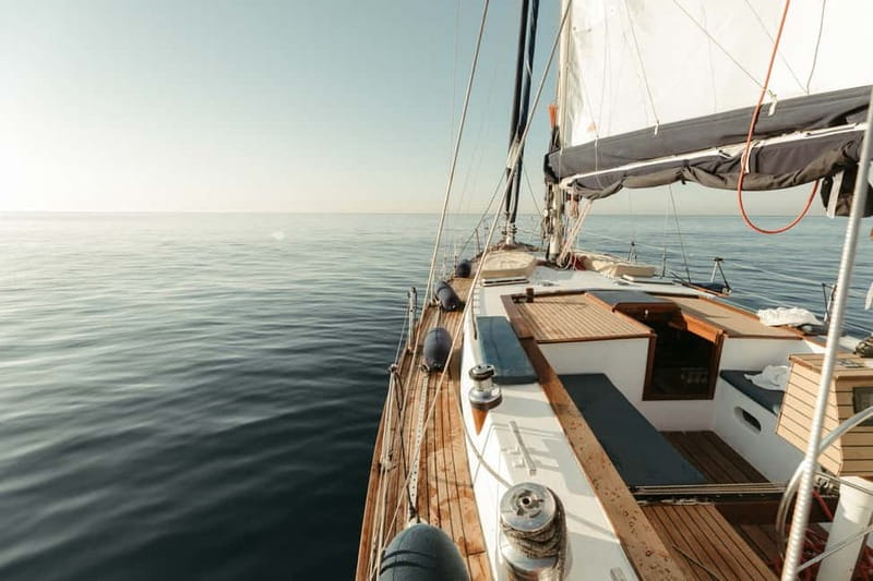 Barcelona: Sailing on a Classic Ketch Boat with tapas & cava - Open-Water Time, Swimming, and Paddle Boarding