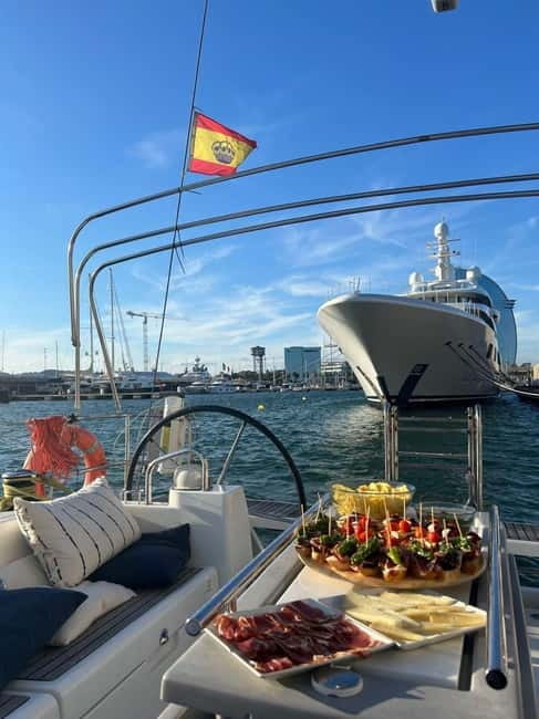 Barcelona: Sailing Tour with Tapas, Drinks and Swim Stop - Barceloneta Beach sailing leg: the views that feel like a different city
