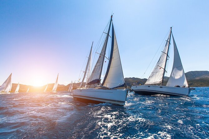 Barcelona: Sailing Tour with Tapas, Drinks, Swim & Sunset Option - Yacht sailing from Port Vell: a simple break from Barcelona’s crowds