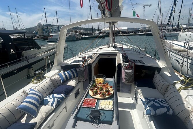 Barcelona: Sailing Tour with Tapas, Drinks, Swim & Sunset Option - The Mediterranean swim stop: the best part, if conditions cooperate