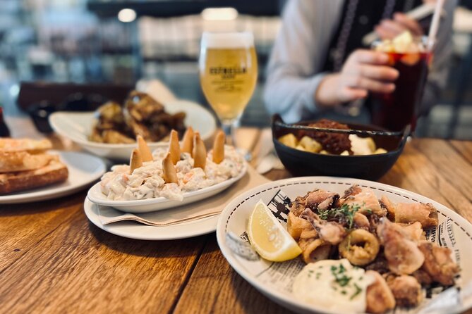 Barcelona Sightseeing by Bike with Photo Shooting and Tapas - Getting Your Bearings: Port Vell and the Beachfront Setup