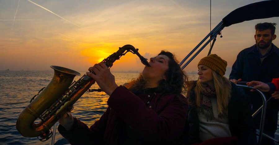 Barcelona: Sunset Live Sax and Sailing Experience with Tapas - Setting Sail from Port Olímpic for Sunset Views