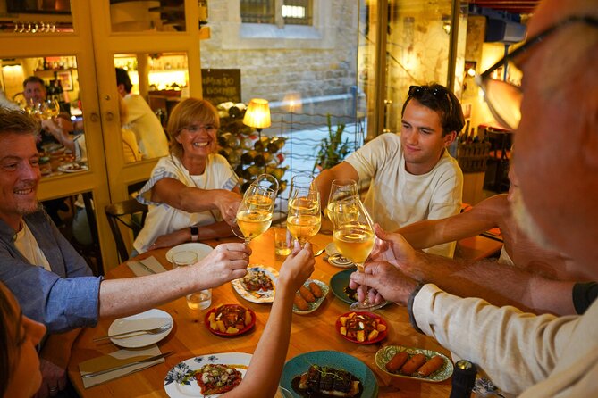 Barcelona Tapas and Wine Experience Small-Group Walking Tour - Palau Dalmases and the flamenco thread running through the walk