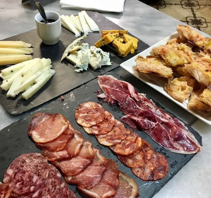 Barcelona Tapas Crawl food & drinks all included - Starting point by the Molino Theater: timing that keeps the night smooth