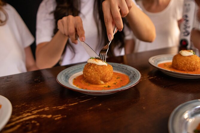 Barcelona Tapas Food Tour, Taverns, History & Local Culture - Guides and group vibe: the difference between okay and memorable
