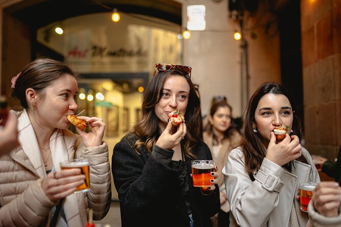 Barcelona Tapas Food Tour with Lunch or Dinner in El Born - Carrer de la Mercè: a 1945 bodega serving boquerones and vermouth