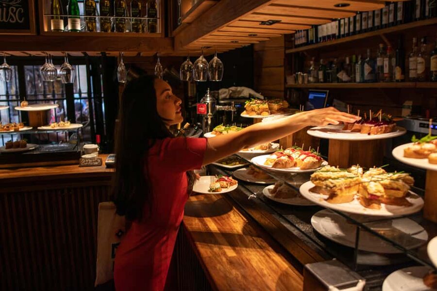 Barcelona Tapas Tour, Taverns, History & Local Culture - Gothic Quarter lanes and your first tavern: pintxos, bravas, and pan con tomate