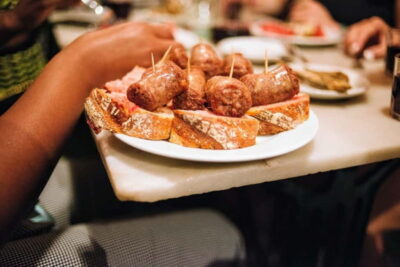 Barcelona: Tapas, Wine & History Tour of the Old Town - Meeting Point at Palau de la Balmesiana: Easy Start, Real Neighborhood Vibes