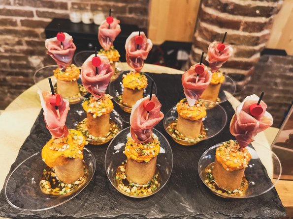 Barcelona Tapas & Wine Private Tour in Traditional Taverns - Stop 3: Carrer de Montcada for beef tapa and red wine
