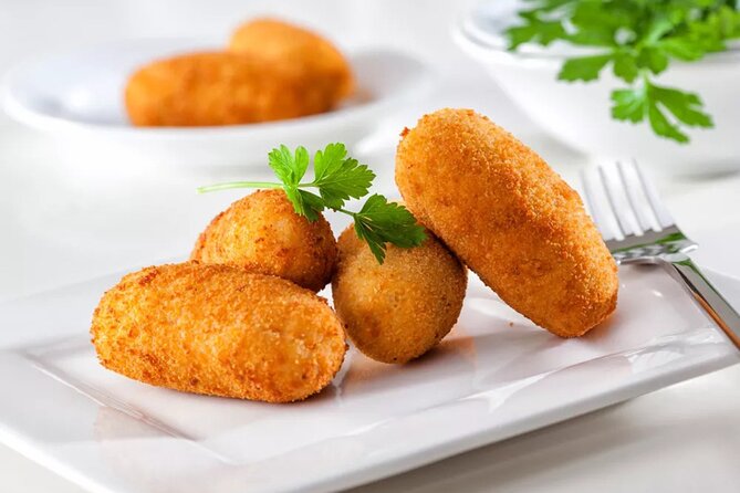 Barcelona Vegetarian Tapas and Food Walking Tour in Gracia - Gràcia atmosphere: not just where you eat, but how the walk feels