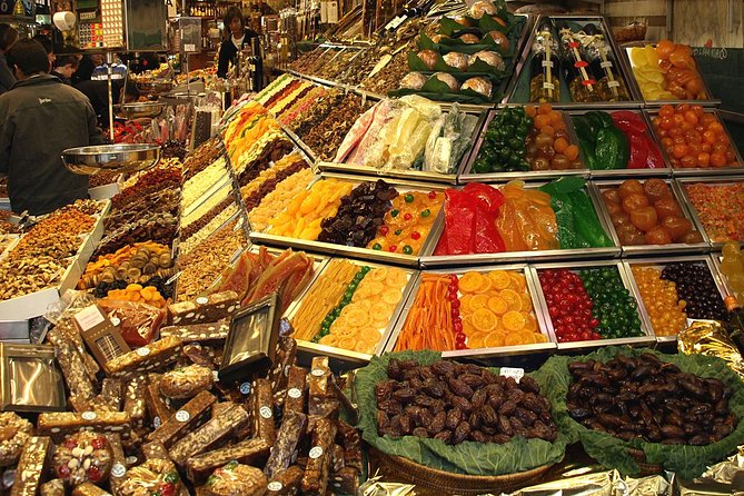 Boqueria & St Caterina Markets with Food & Tapas Small Group Tour - The final restaurant stop: Catalan and Spanish meat dishes with pairing