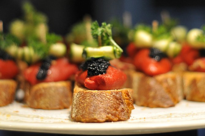 Born to Eat: Gourmet Tapas & Wine Small Group Tour in Old Barcelona - Santa Maria del Mar and the Born name: history you can walk on