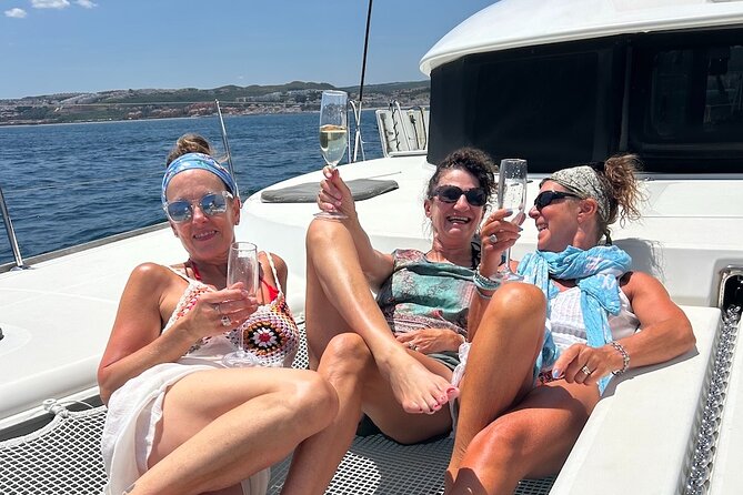 Catamaran Sailing Experience Manilva Tapas Drink Dolphins Swim Stop - Homemade tapas onboard: included, fresh, and filling
