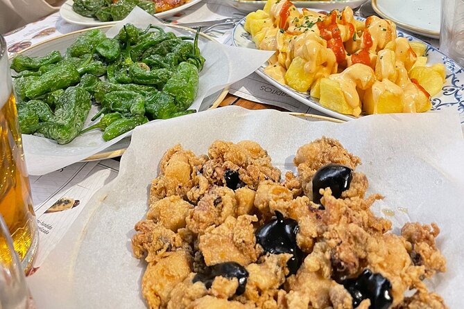 Christmas Tapas and Wine Tour in Valencia - The Tapas You Can Expect: Patatas Bravas, Jamón, and More