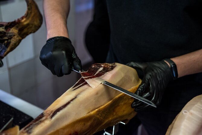 Eat Like a Local in Barcelona: Tapas, Wine & Tradition - El Born on the extended option: art streets and a final cozy tapas stop