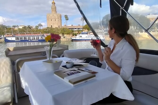 Exclusive Seville Boat Tour with Shared Tapas - Expo-Era Seville: 1929 and 1992 from the Water