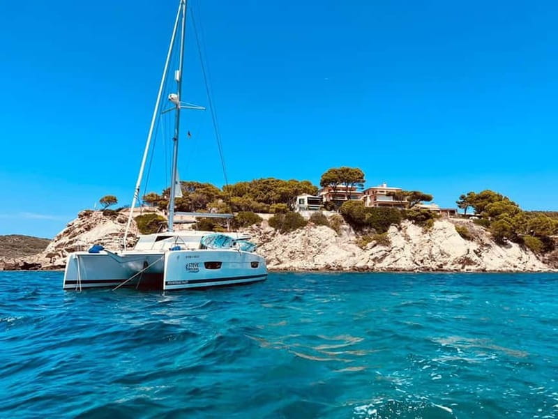 From Palma: Luxury Catamaran Group Tour with Tapas & Drinks - Sailing Out Past Palma: Views Plus Breathing Room