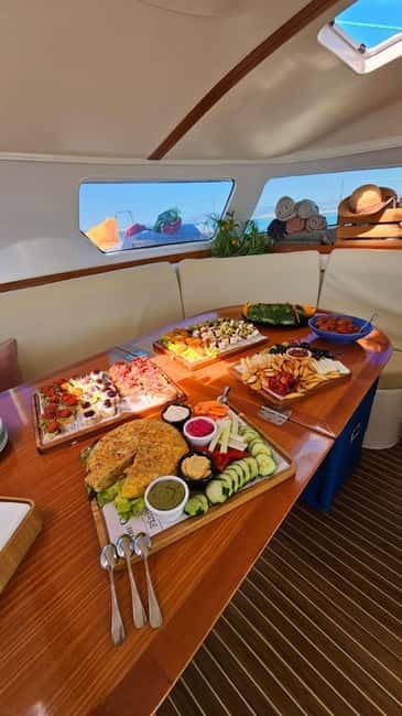 From Palma: Luxury Catamaran Group Tour with Tapas & Drinks - The Bay Stop: Where the Snorkeling and SUP Time Actually Happens