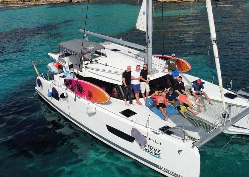 From Palma: Luxury Catamaran Group Tour with Tapas & Drinks - Tapas on Board: Homemade, Shared, and Easy to Keep Casual