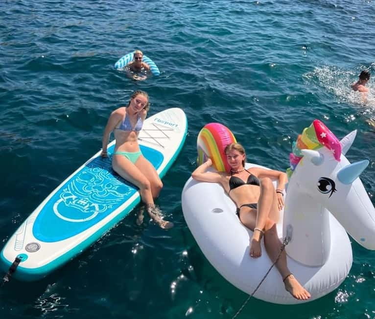 From Palma: Luxury Catamaran Group Tour with Tapas & Drinks - Drinks and the Onboard Party-Level Dial