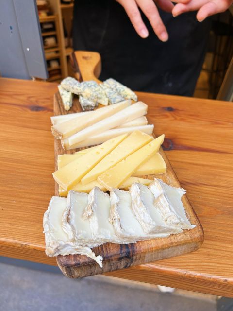 Girona Evening Food Tour & Tapas Bar Experience - Rambla de la Llibertat and Plaça dels Raïms: Quick Guided Stops That Add Meaning