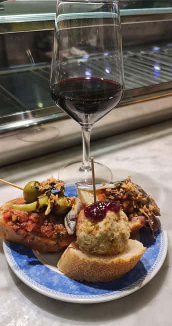 Granada: Spanish Tapas Tour with Local Guide. All included. - Stop 1: wine from Granada and tapas you can choose