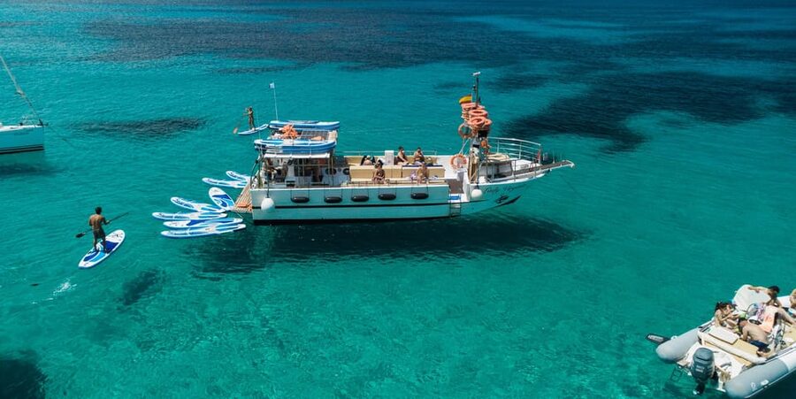 Ibiza: Scenic Sunset Cruise with Tapas and Drinks - Water time: snorkel and paddle surf in crystal-clear water