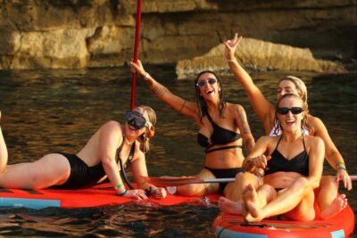 Ibiza: Sunset Boat Tour with Water Sports, Open Bar & Tapas - Getting On Board at Sant Antoni Port (And What to Watch For)