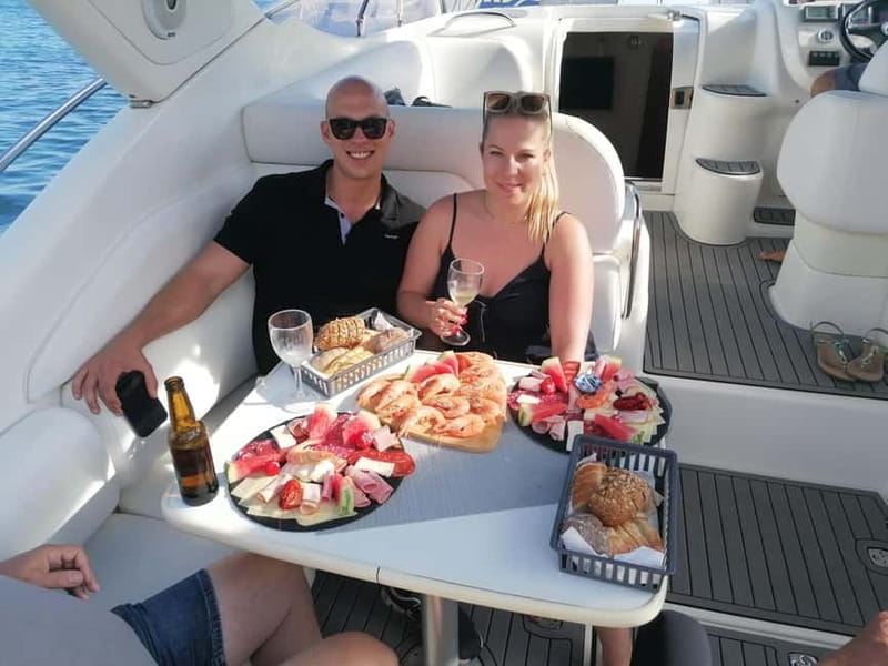 Lagos: Private Luxury Cruise with Tapas and Drinks - Drinks, champagne, and the boat’s lounging setup