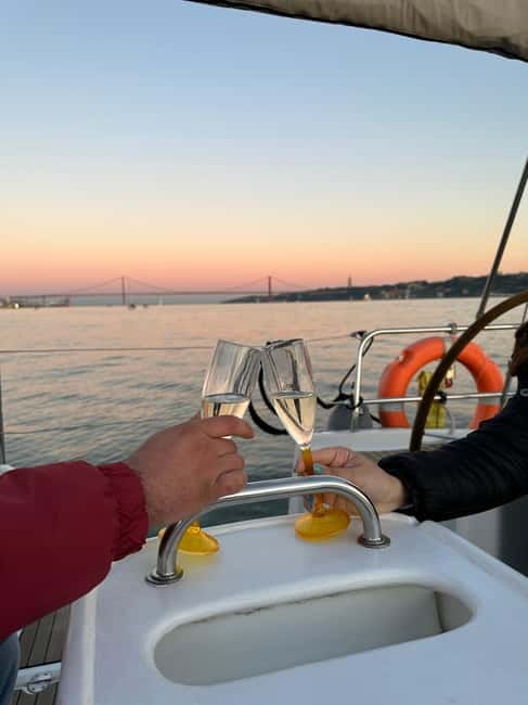 Lisbon: Romantic Cruise with Wine & Portuguese Tapas - The Crew and the On-Board Storytelling Style