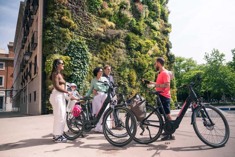 Madrid: 3 h. Guided Highlights Bike Tour with Optional Tapas - CaixaForum’s Vertical Garden and the Prado-to-Retiro Shift