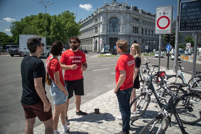 Madrid: 3 hour Guided Highlights Bike Tour with Optional Tapas - Between Old Squares and Modern Hits: The Neighborhood Segment