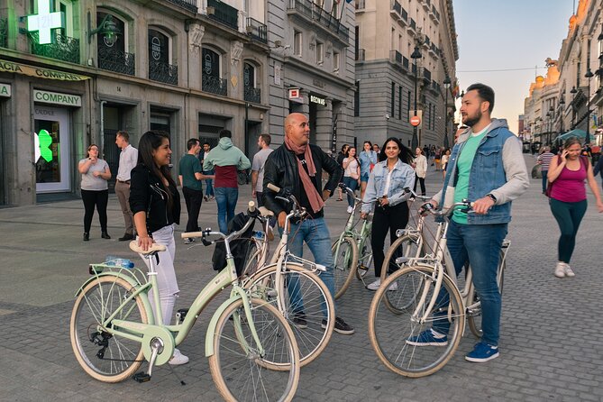 Madrid at Night: Vintage Bike Tour of City Highlights - Puerta del Sol: Madrid’s Center of Gravity