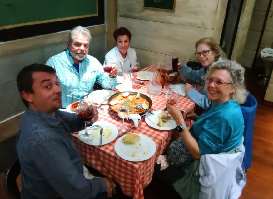 Madrid: Authentic Tapas Evening Tour with a side of History - The dinner finish: where paella and friends show up