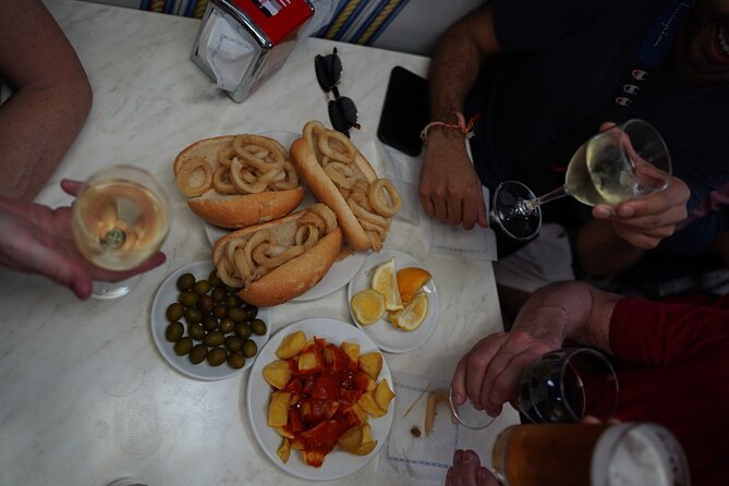 Madrid by Night: Tapas Crawl, Local Drinks & Hidden Gems - Stop 3: La Latina, a tiny six-table restaurant, and tapas that lean traditional