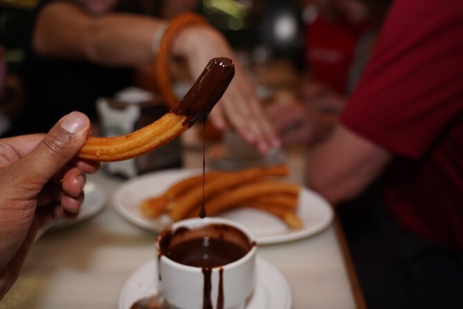 Madrid by Night: Tapas Crawl, Local Drinks & Hidden Gems - Stop 5: Puerta del Sol dessert finish that brings the night to a sweet close