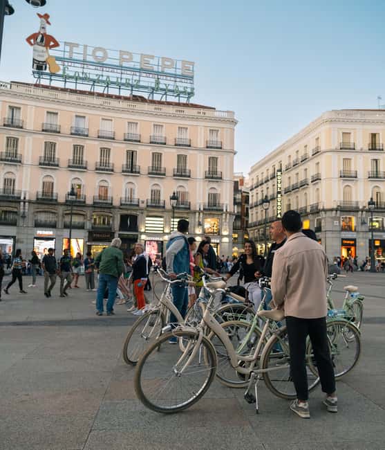 Madrid by Night: Vintage Bike Tour Highlights/Optional Tapas - Gran Vía and Sol: landmarks lit up, quick lessons included